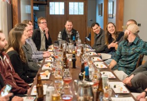 Optimized-Canva - Group of People Sitting on Dining Table