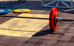 Barbell on the floor in gym