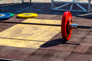 Barbell on the floor in gym