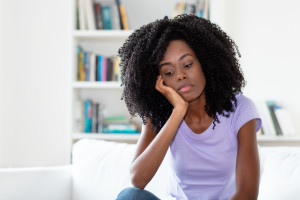 Sad and frustrated african american woman