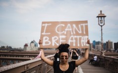 woman-holding-a-sign-in-protest-4613880 (1)