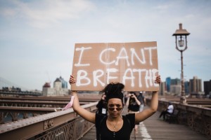 woman-holding-a-sign-in-protest-4613880 (1)